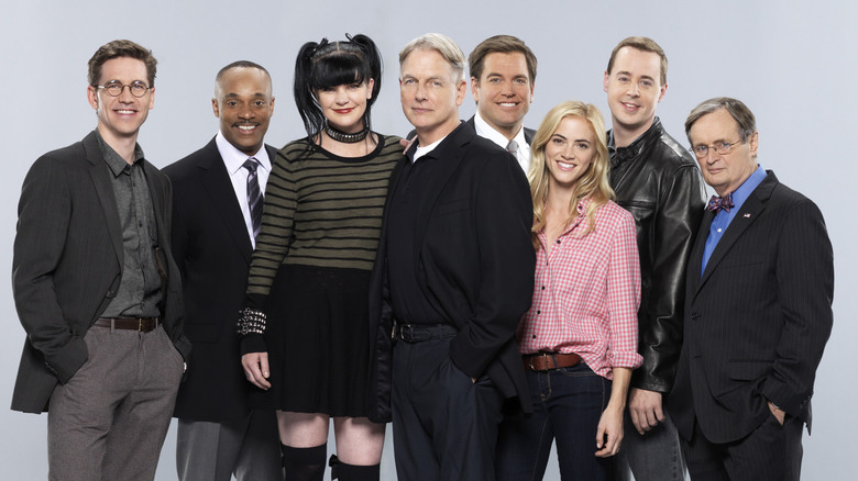 The cast of NCIS. Pictured from left to right: Brian Dietzen, Rocky Carroll, Pauley Perrette, Mark Harmon, Michael Weatherly, Emily Wickersham, Sean Murray and David McCallum. NCIS airs Tuesdays (8:00-9:00 PM, ET/PT) on the CBS Television Network. Photo: Kevin Lynch/CBS ÃÂ©2014 CBS Broadcasting Inc. All Rights Reserved