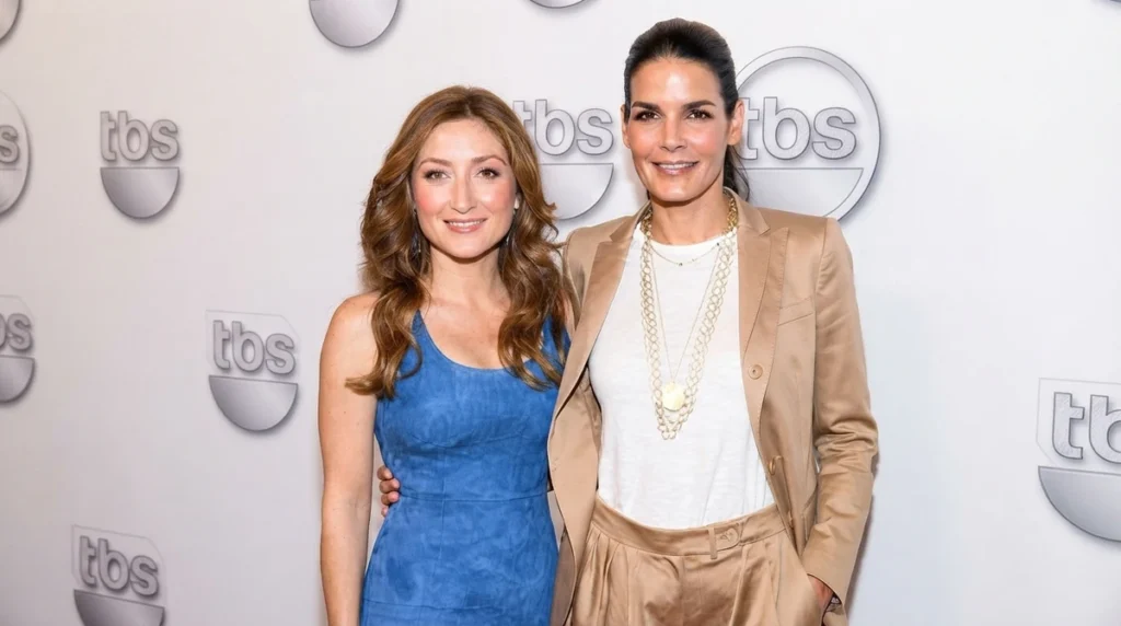 Angie Harmon and Sasha Alexander standing together at a red carpet event
