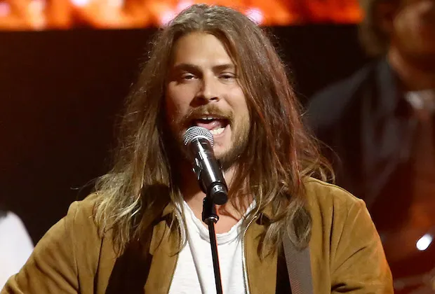 Cory Asbury, Christian rocker and actor, on stage performing