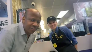 Pregnant waitress Hannah Hill gets emotional as Bishop Phelps and others offer support at Waffle House