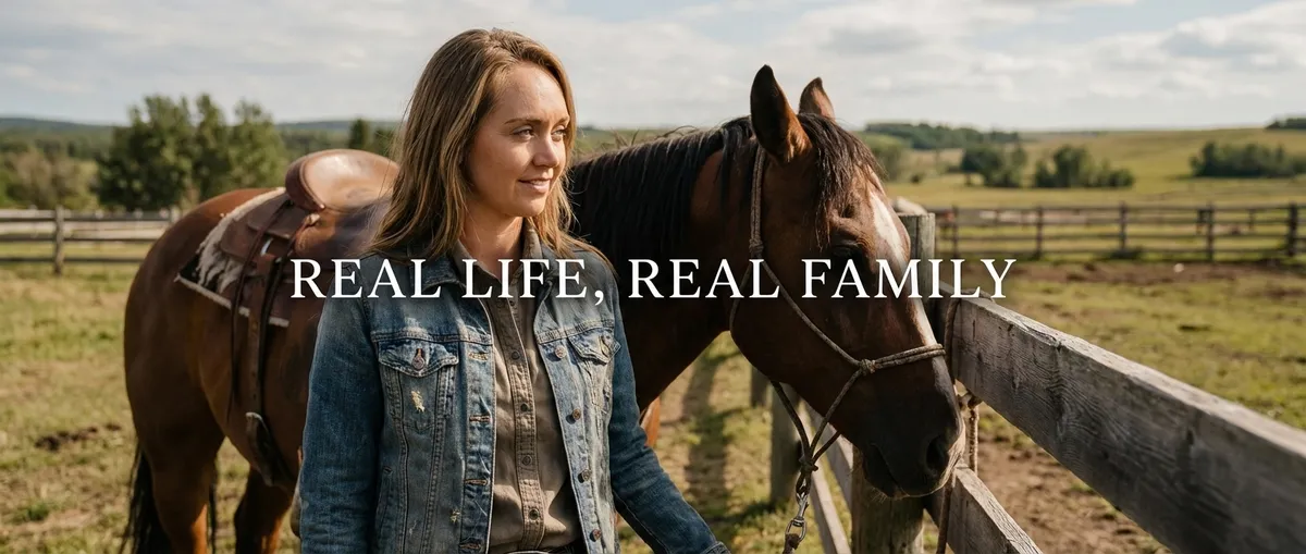 Amber Marshall standing on her ranch beside a horse, reflecting on her role as Amy Fleming on Heartland